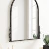 sleek black metal framed arched mirror for bathroom