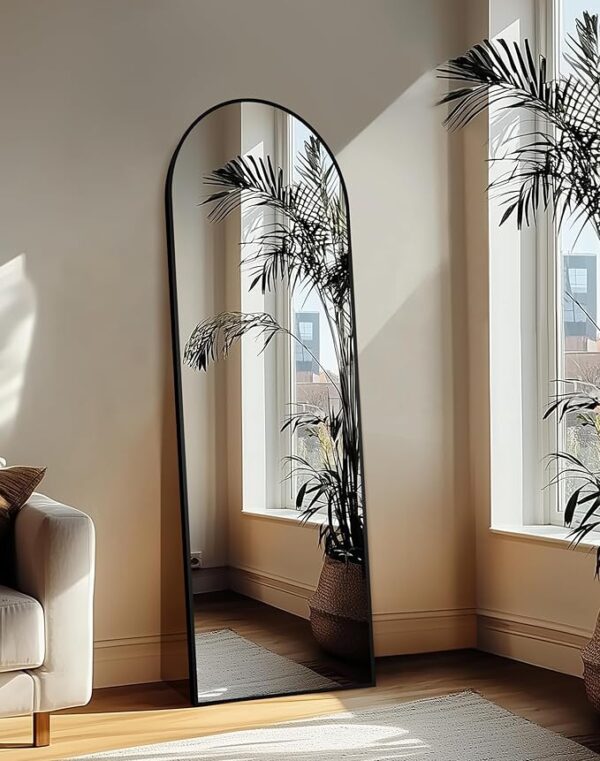 Standing black arched full body mirror with sleek aluminum frame