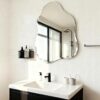 Asymmetrical vanity mirror frameless design for modern home