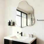 Asymmetrical vanity mirror frameless design for modern home