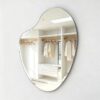Modern asymmetrical bathroom mirror frameless irregular design with polished beveled edge