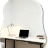 Modern frameless asymmetrical bathroom wall mirror with beveled edge