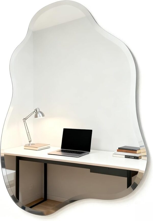 Modern frameless asymmetrical bathroom wall mirror with beveled edge