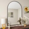 black arched bathroom mirror with aluminum frame