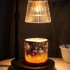 red scented candle with warm LED lighting