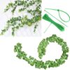 Realistic faux ivy vine garland decorating cozy bedroom wall space