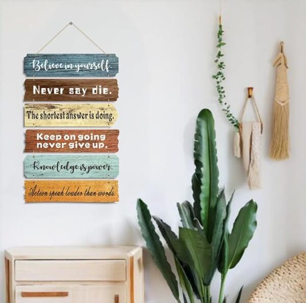 Room Flowy rustic motivational quote sign hanging in farmhouse living room with warm teal and brown tones