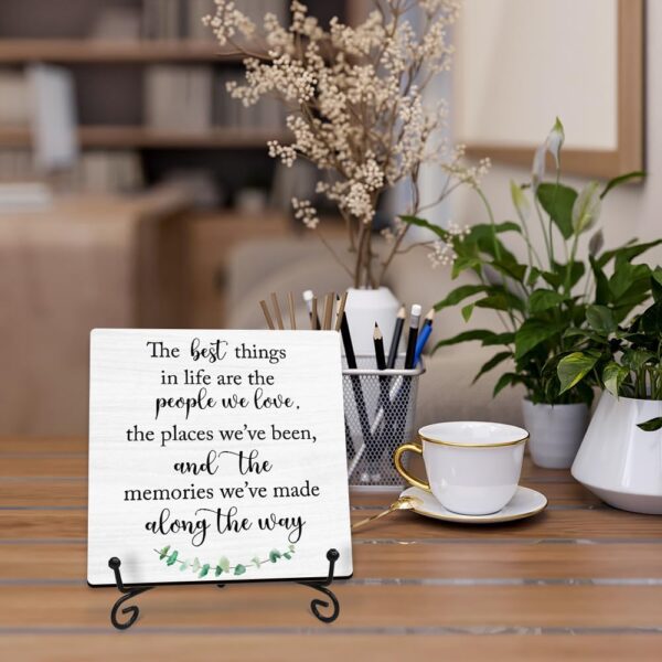 Decorative wooden quote sign displayed on office desk